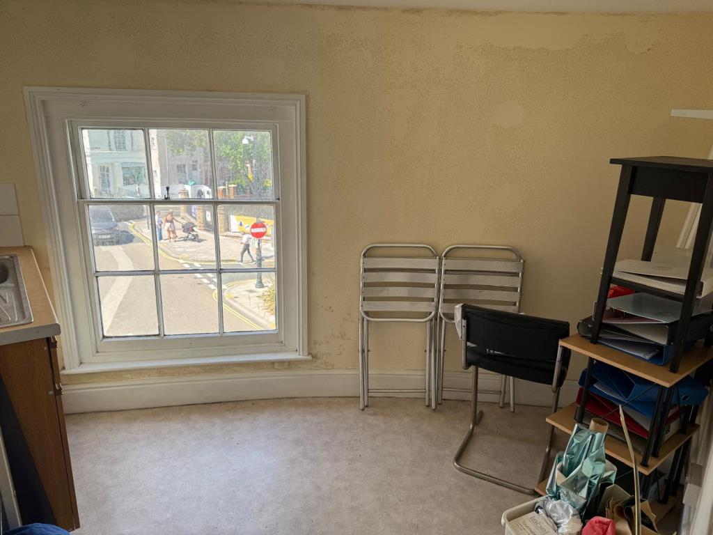 Lot: 114 - FREEHOLD FOUR STOREY TOWN CENTRE SHOP AND UPPER PARTS WITH CONVERSION POTENTIAL - Storage room with sink
